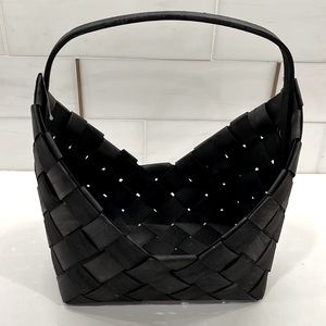 Hobby Lobby Decorative Black asymmetrical opening with wide weaving details.